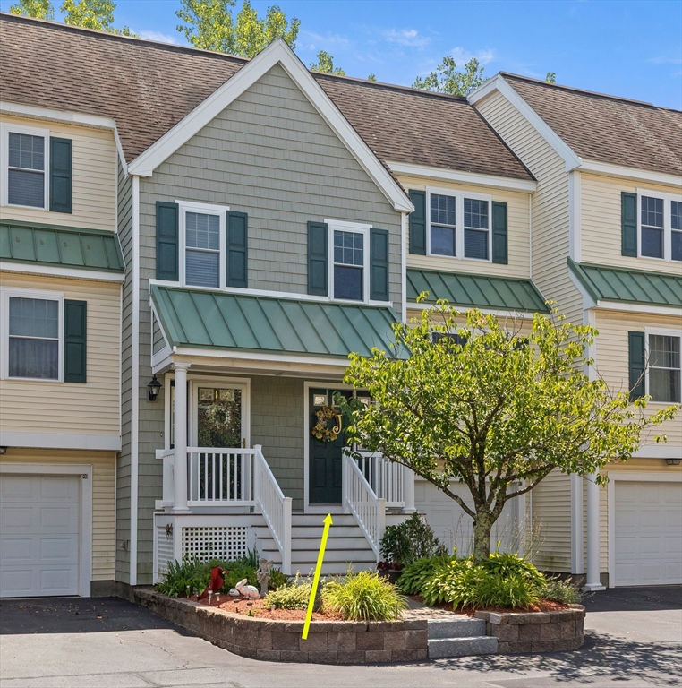 35 Collins Street, Unit 87 Danvers, MA 01923 - Photo 26 of 28 a front view of a house with plants