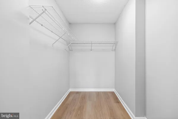 a view of a small space with racks on the wall