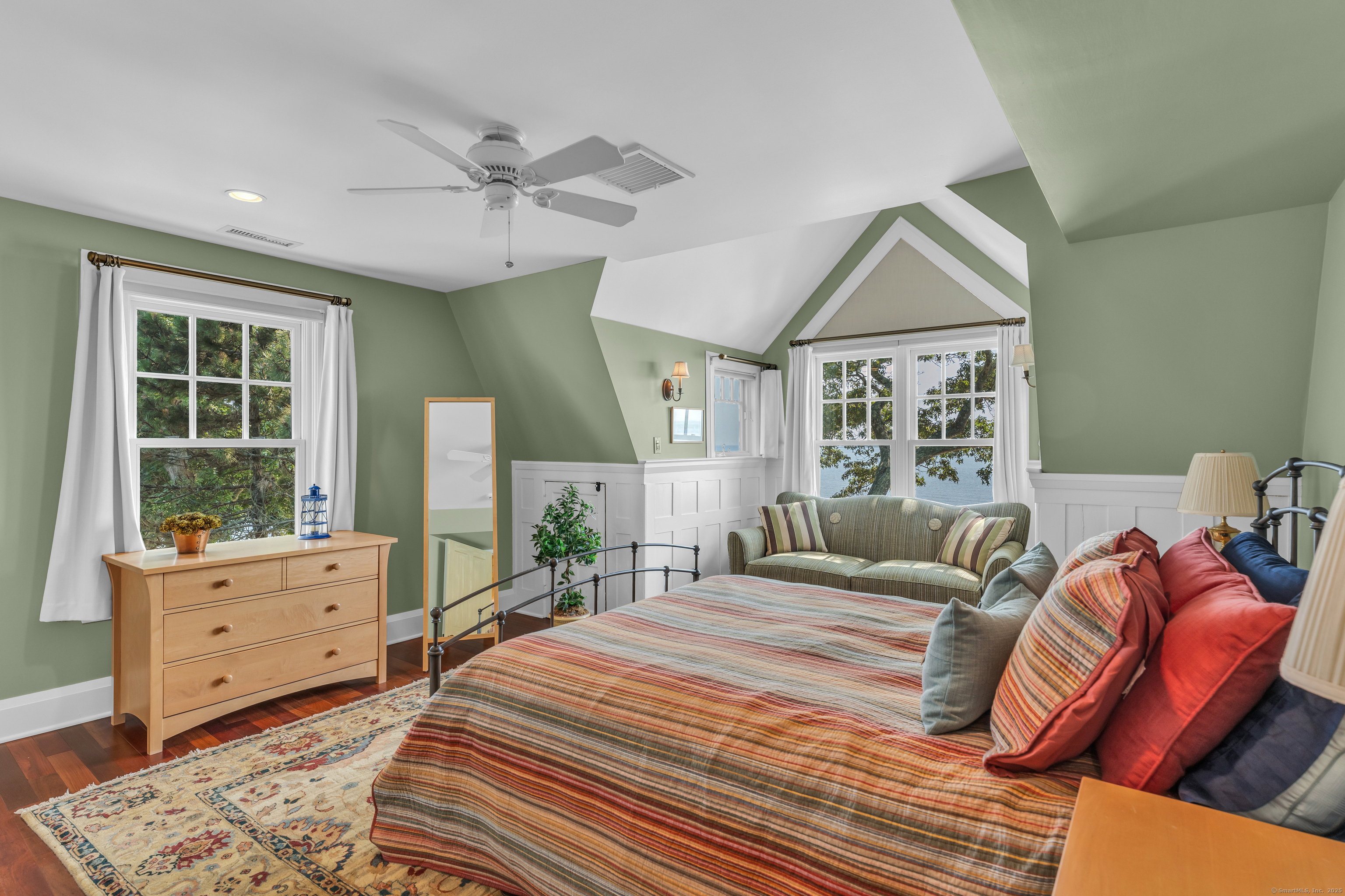 55 Shore Road Clinton, CT 06413 - Photo 20 of 33 a bedroom with a large bed and a window