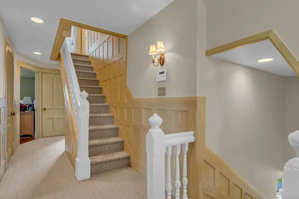 a view of entryway with wooden floor