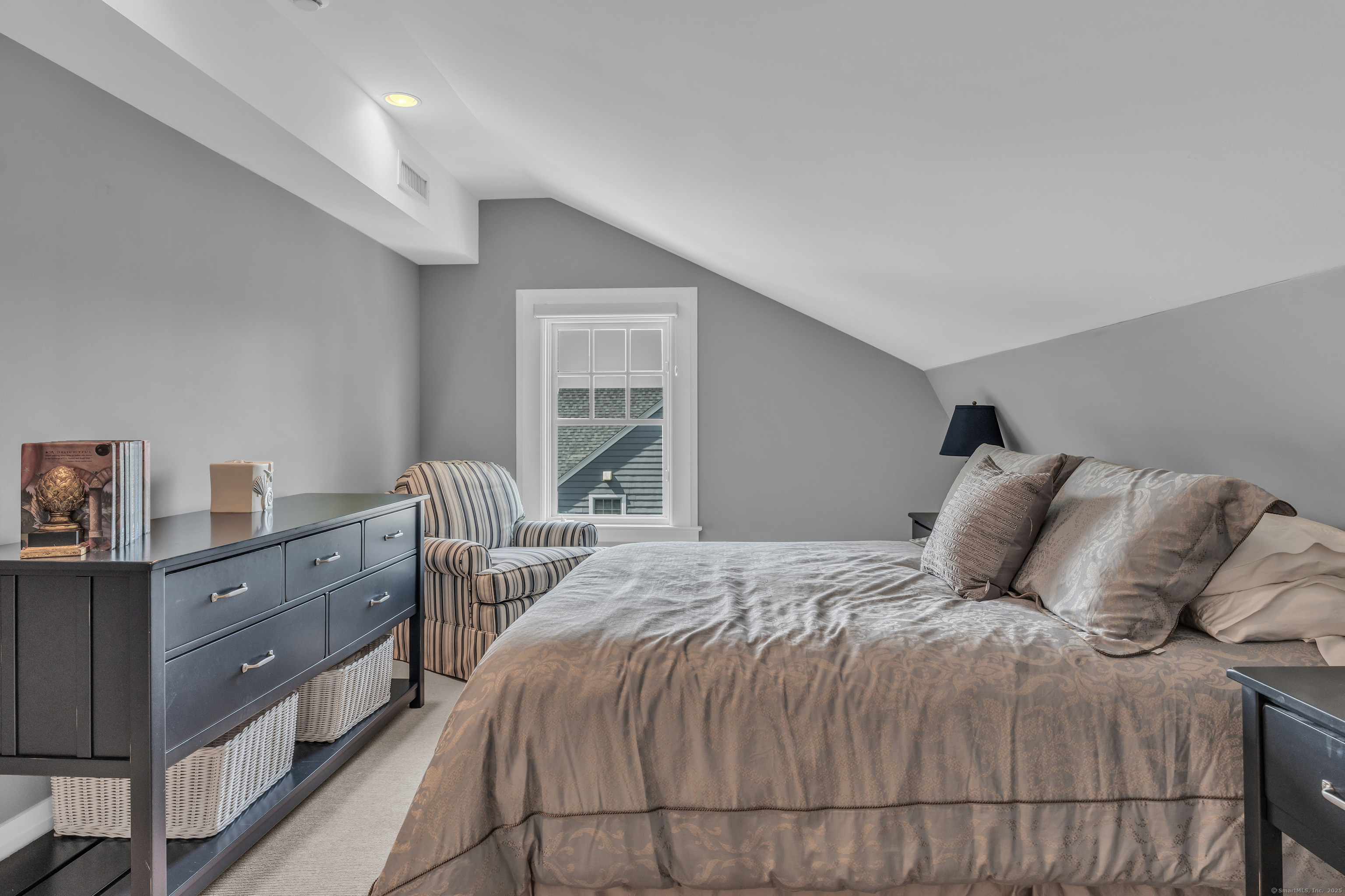 55 Shore Road Clinton, CT 06413 - Photo 23 of 33 a bedroom with a bed and window