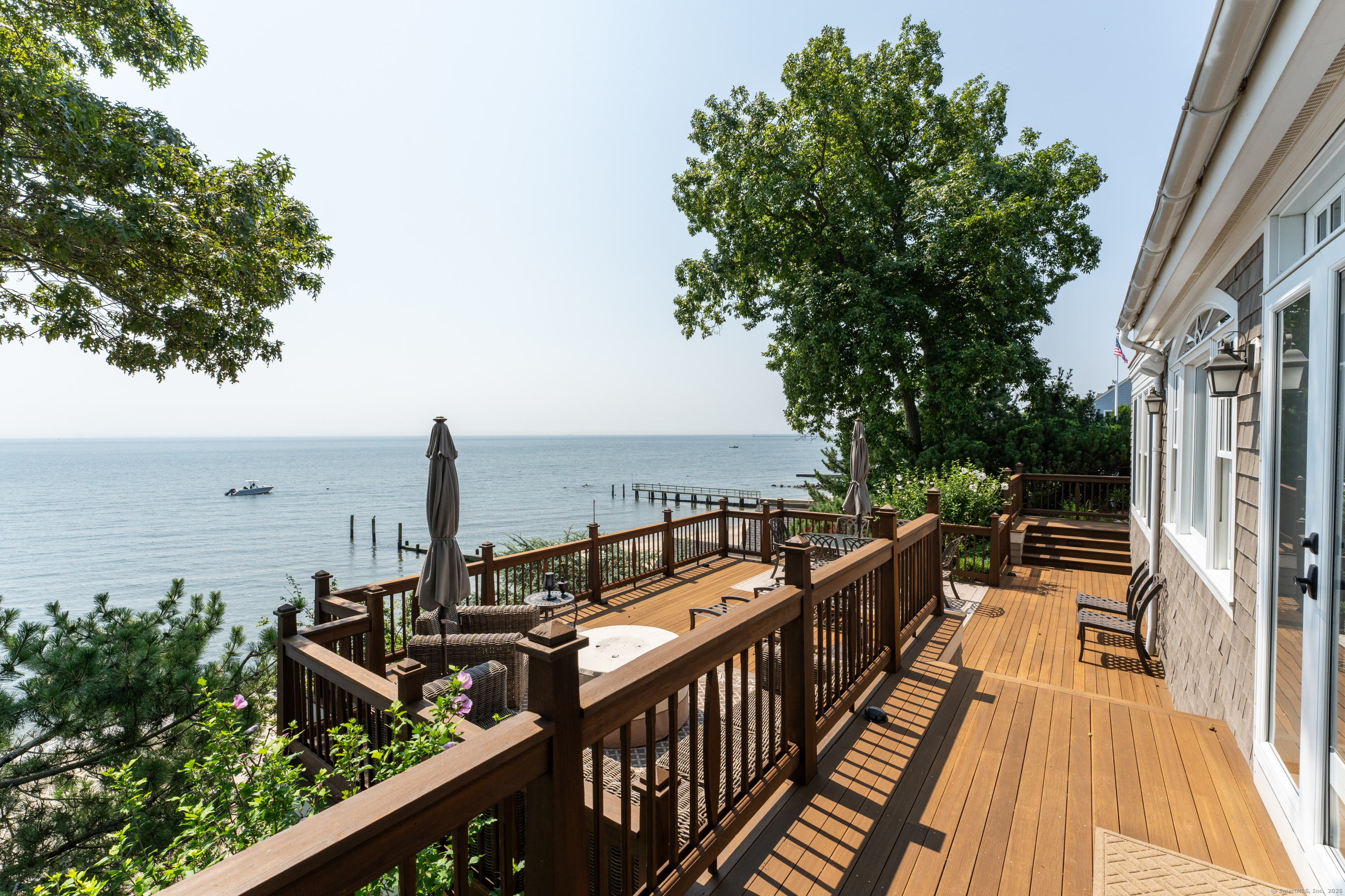 55 Shore Road Clinton, CT 06413 - Photo 29 of 33 a view of a balcony with chairs