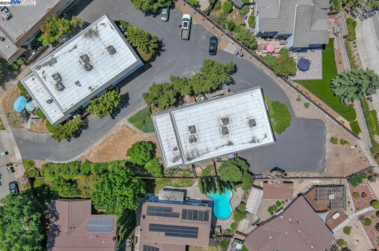 4327 Fairlands Drive Pleasanton, CA 94588 - Photo 16 of 16 an aerial view of a house with a yard and a garden