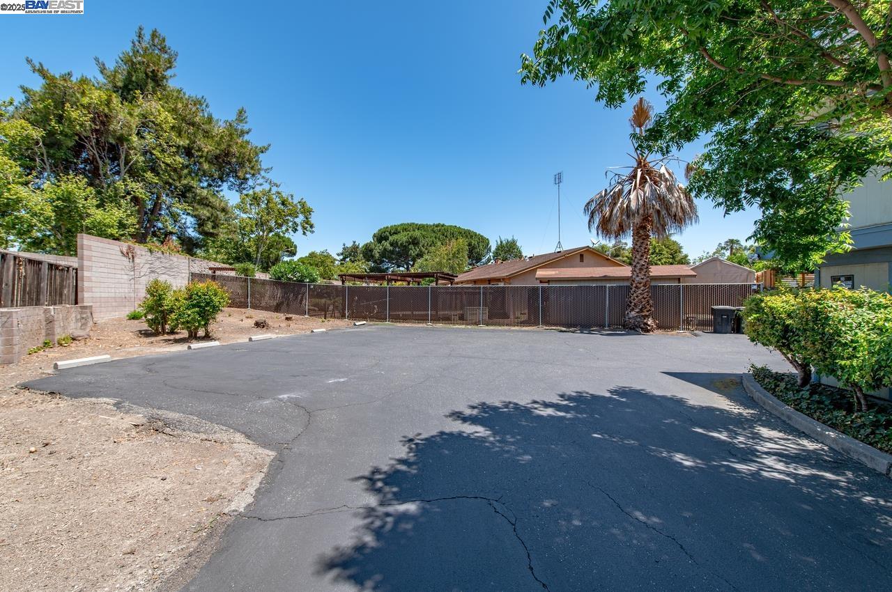 4327 Fairlands Drive Pleasanton, CA 94588 - Photo 4 of 16 a view of a street with a trees