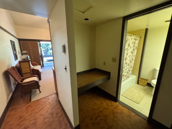 a view of an entryway with a door