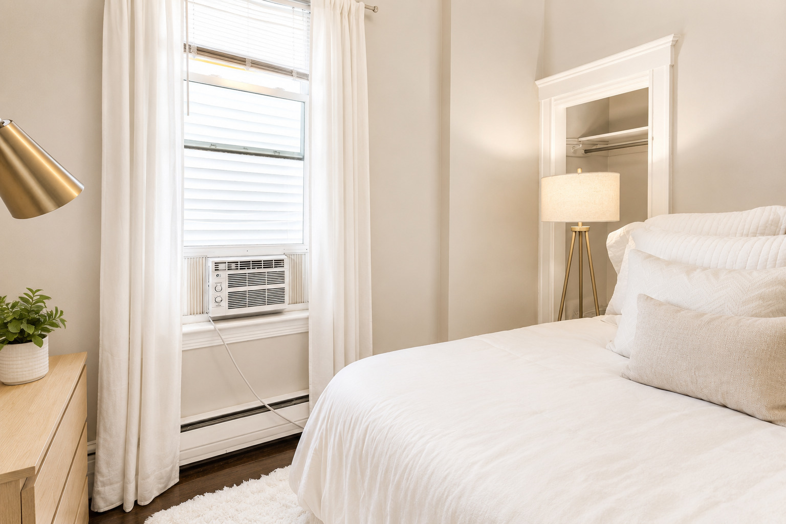 3749 North Seminary Avenue, Unit 1 Chicago, IL 60613 - Photo 16 of 25 a bedroom with a bed and a window