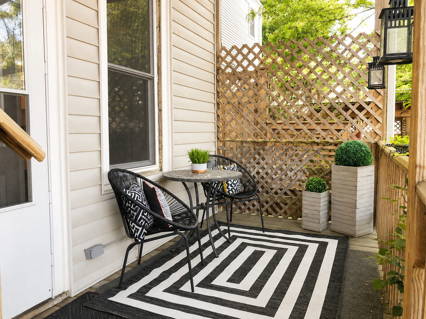 3749 North Seminary Avenue, Unit 1 Chicago, IL 60613 - Photo 18 of 25 a view of balcony with two chairs and a potted plant