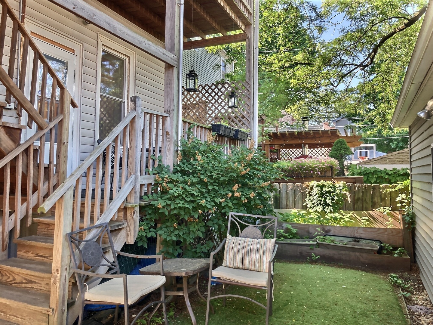 3749 North Seminary Avenue, Unit 1 Chicago, IL 60613 - Photo 21 of 25 a view of balcony with two chairs and a table