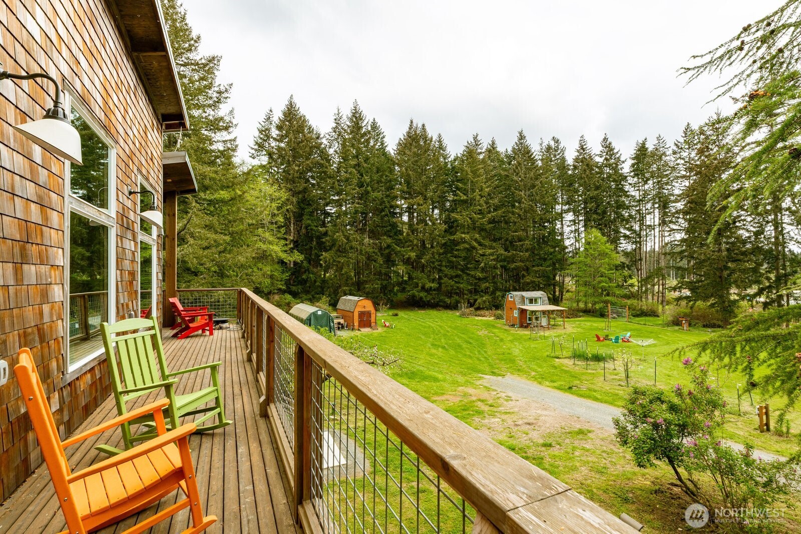 5287 Maxwelton Road Langley, WA 98260 - Photo 21 of 40 a view of a balcony with an outdoor seating