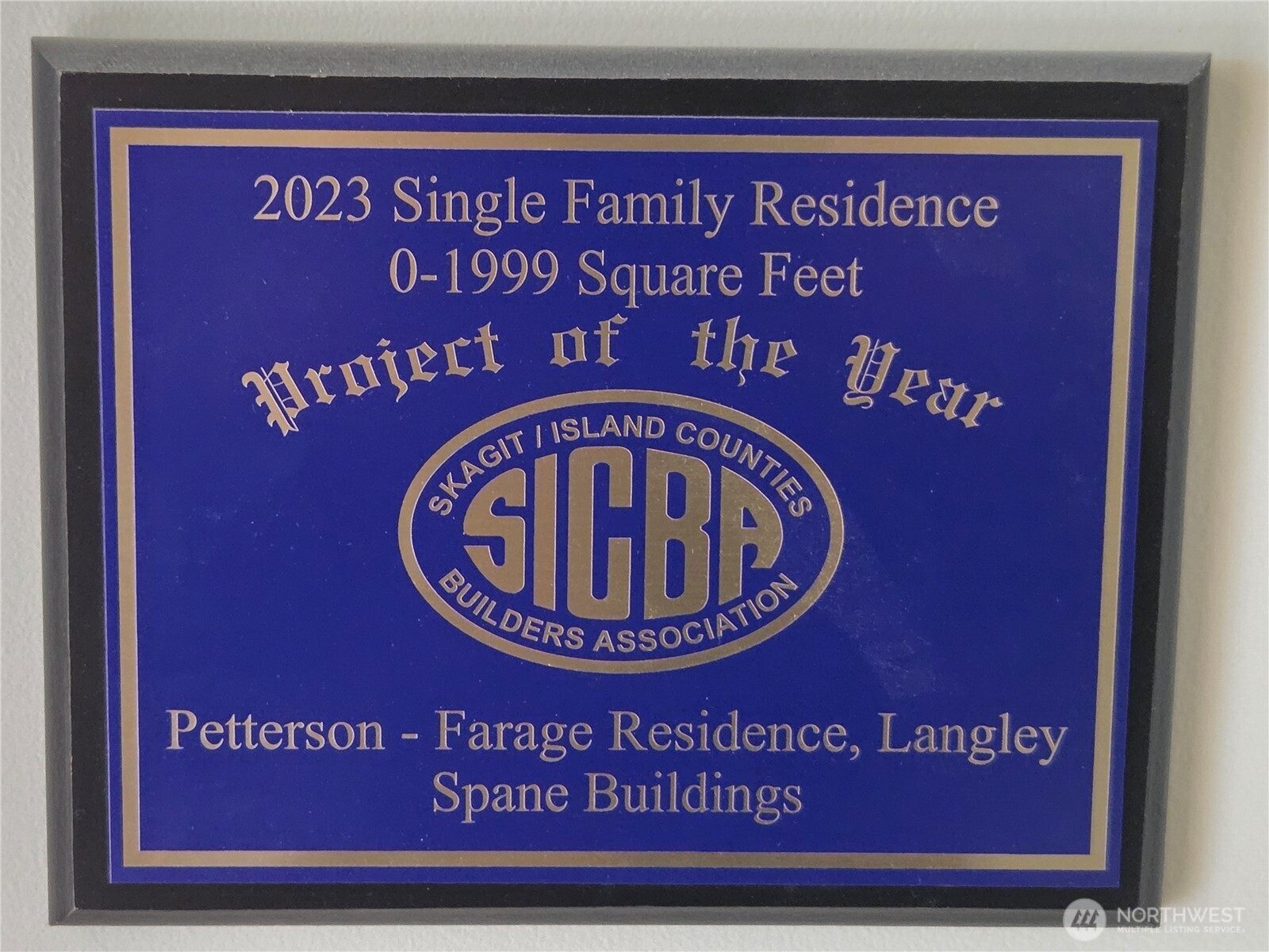 5287 Maxwelton Road Langley, WA 98260 - Photo 27 of 40 a sign that is on a wooden wall