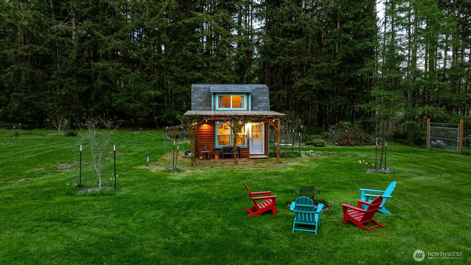 5287 Maxwelton Road Langley, WA 98260 - Photo 30 of 40 a backyard of a house with table and chairs