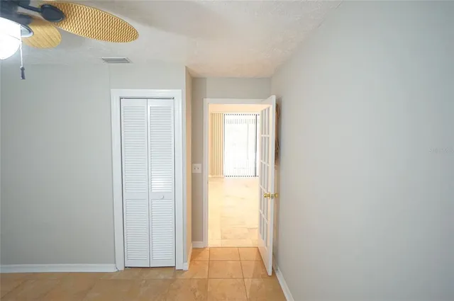 a view of a room that has a window in it