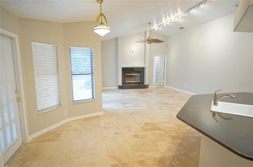 3807 Turkey Oak Drive Valrico, FL 33596 - Photo 21 of 44 a view of an empty room with a fireplace and a window
