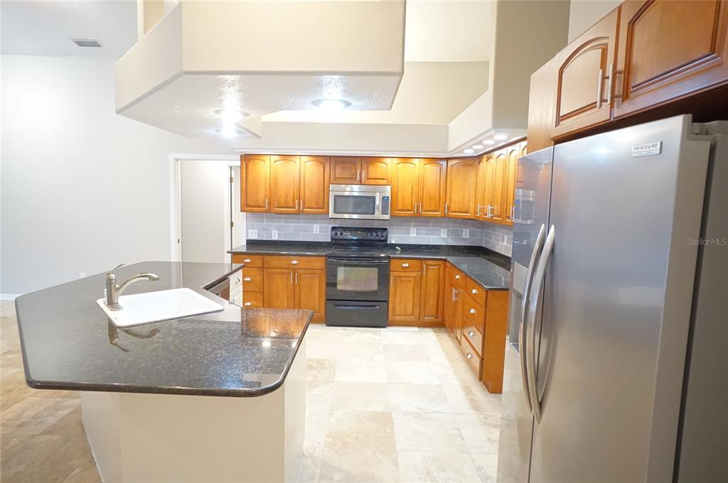 3807 Turkey Oak Drive Valrico, FL 33596 - Photo 22 of 44 a bathroom with a sink and mirror
