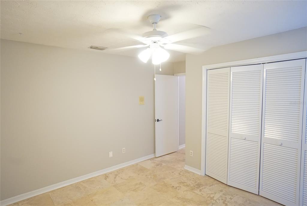 3807 Turkey Oak Drive Valrico, FL 33596 - Photo 24 of 44 an empty room with a ceiling fan and a window