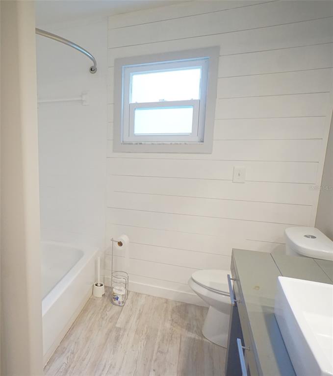 3807 Turkey Oak Drive Valrico, FL 33596 - Photo 26 of 44 a bathroom with a tub sink and a toilet
