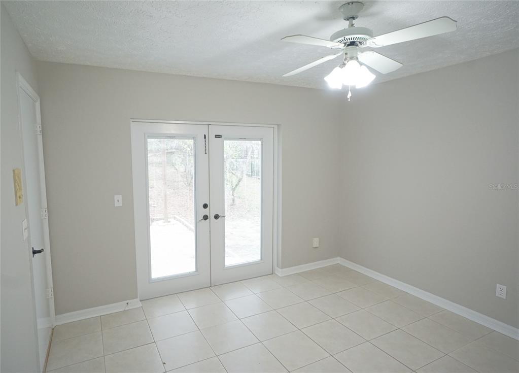 3807 Turkey Oak Drive Valrico, FL 33596 - Photo 30 of 44 an empty room with chandelier fan