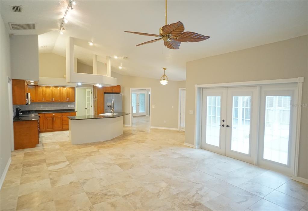 3807 Turkey Oak Drive Valrico, FL 33596 - Photo 37 of 44 a view of kitchen with refrigerator and microwave
