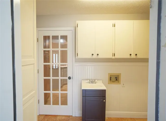 a bathroom with a bathtub and toilet