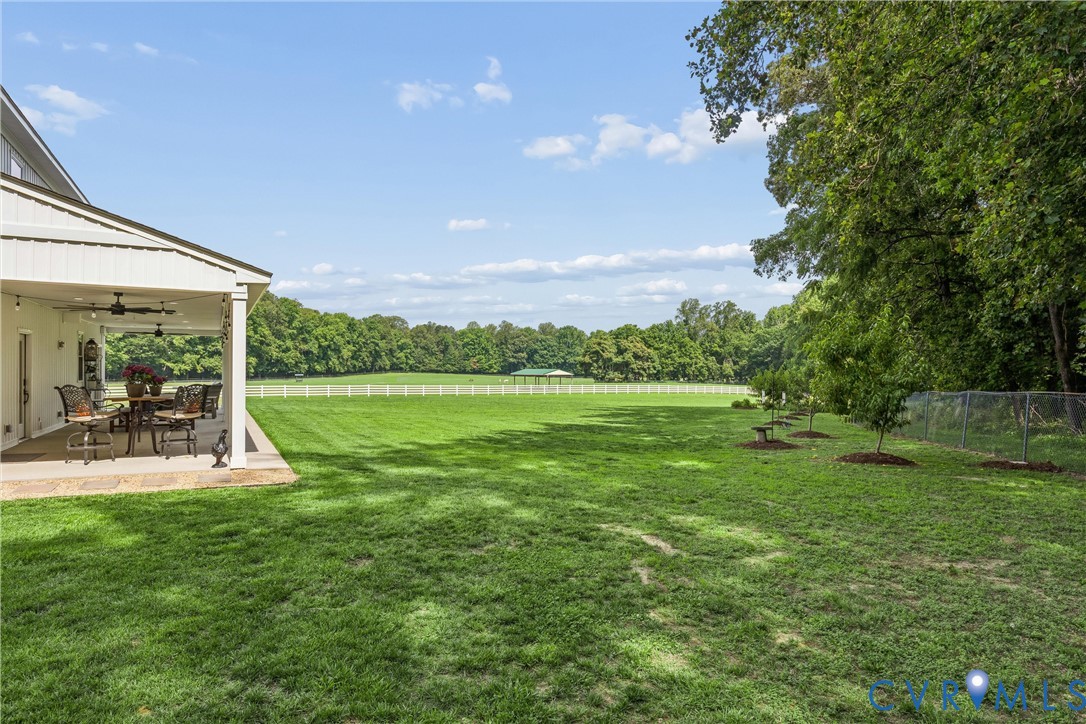 2016 Forge Road Toano, VA 23168 - Photo 40 of 99 Expansive green lawn with a white fence bordering