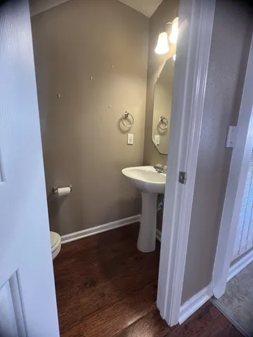 a bathroom with a sink and a toilet