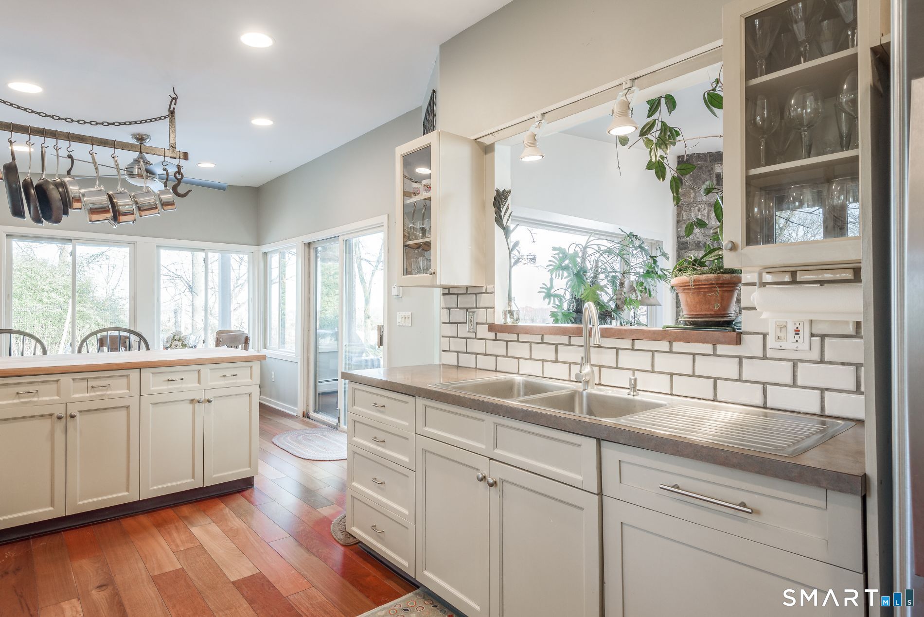 31 Splitrock Road Norwalk, CT 06854 - Photo 26 of 38 a kitchen with a sink cabinets and window