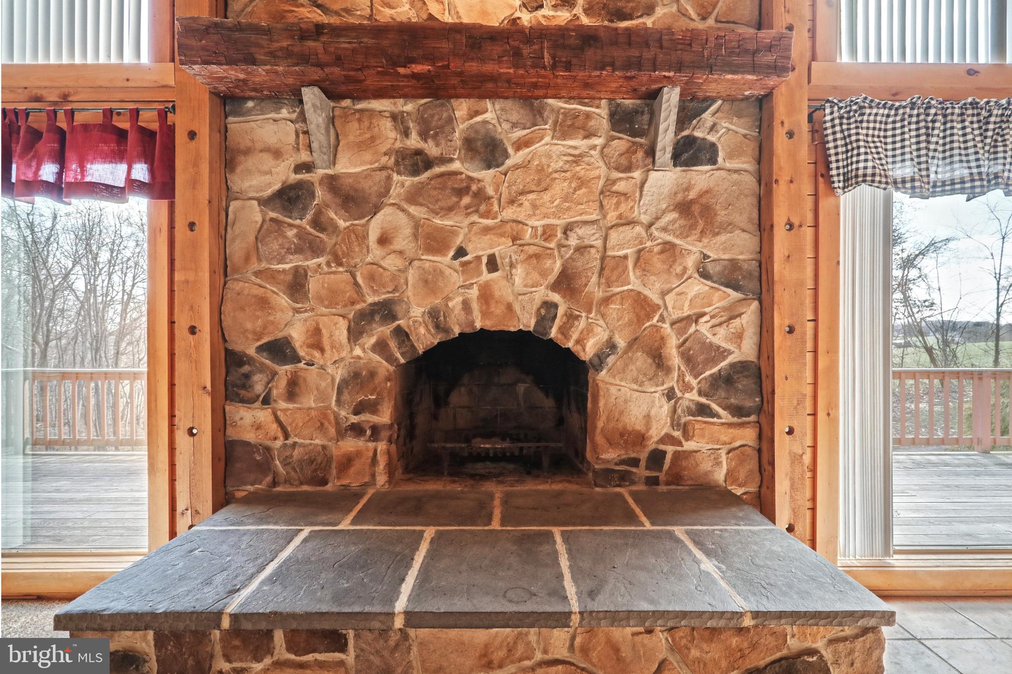 427 Pleasant Grove Road Red Lion, PA 17356 - Photo 12 of 64 Stone-to-the-ceiling fireplace!