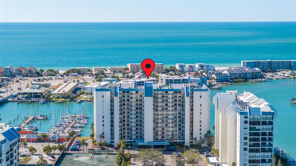 9525 Blind Pass Road, Unit 507 St. Pete Beach, FL 33706 - Photo 2 of 53 a view of outdoor space and city view