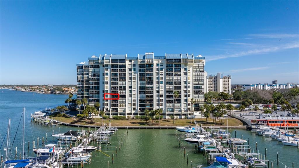 9525 Blind Pass Road, Unit 507 St. Pete Beach, FL 33706 - Photo 49 of 53 a picture of a city with tall buildings