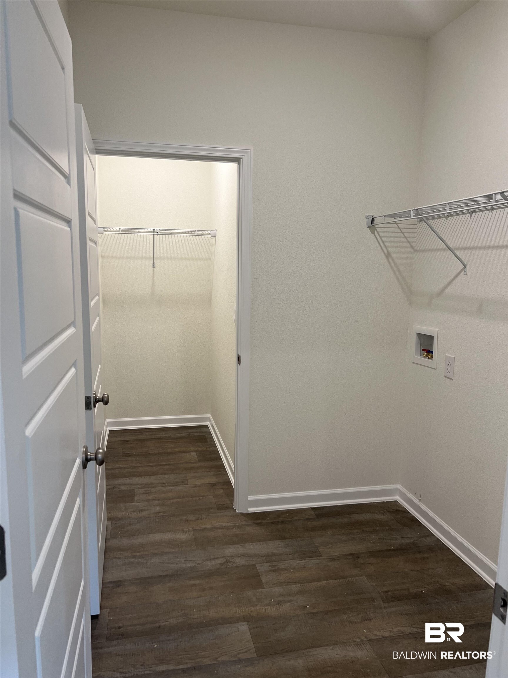 12829 Patriot Way Daphne, AL 36527 - Photo 21 of 38 Laundry room with dark wood-type flooring and washer hookup