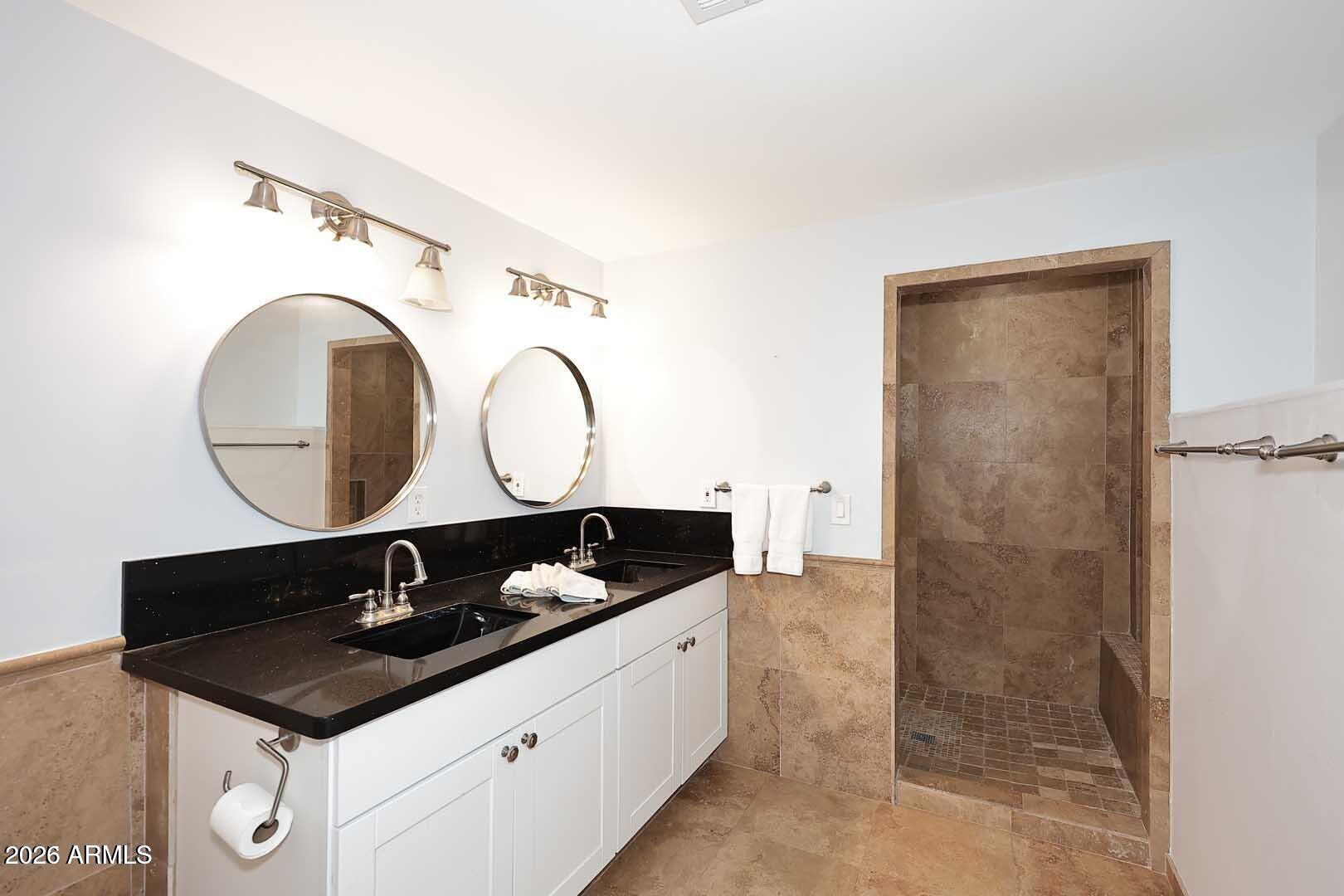 3502 North 22nd Street Phoenix, AZ 85016 - Photo 21 of 35 a bathroom with a sink and a mirror