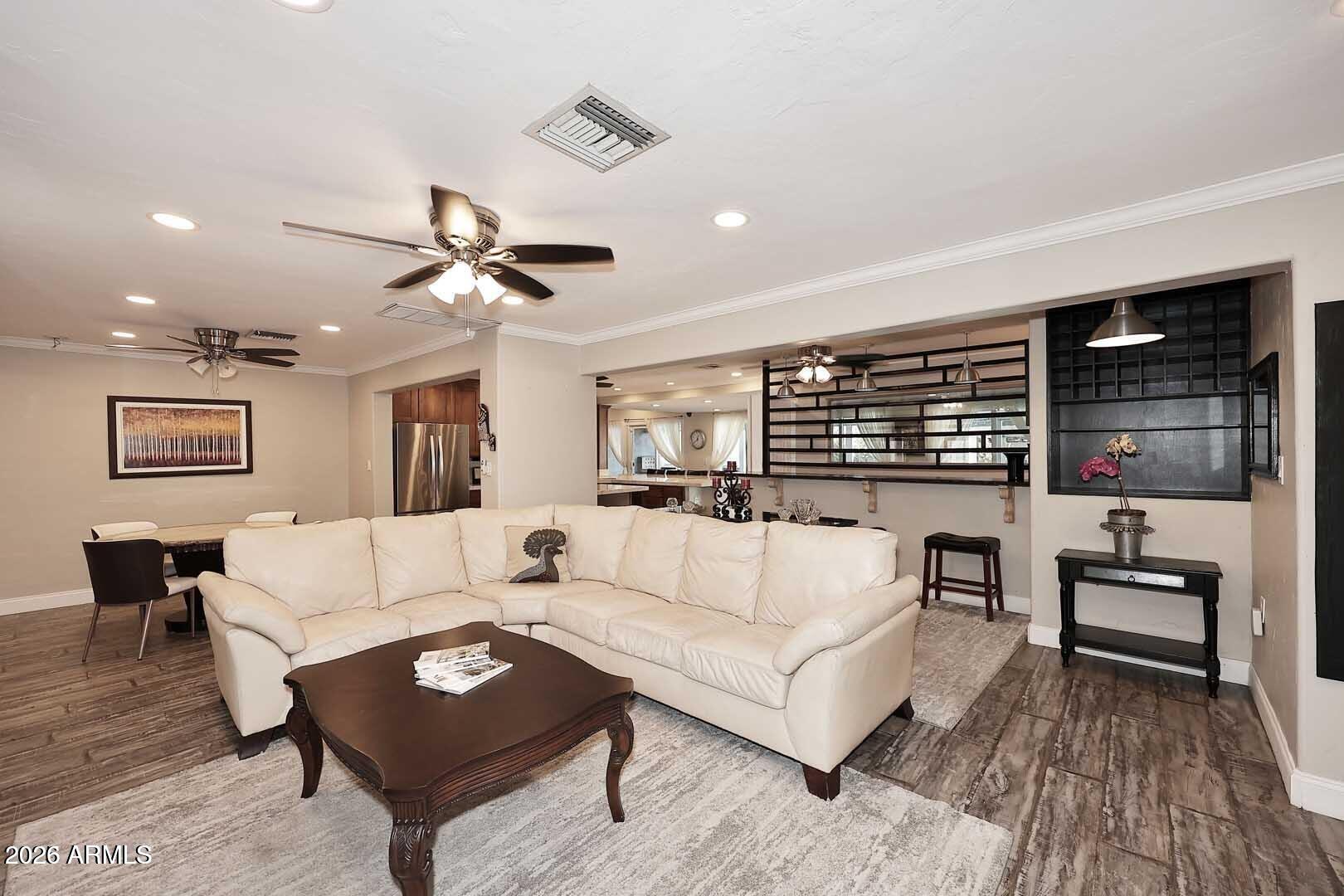 3502 North 22nd Street Phoenix, AZ 85016 - Photo 6 of 35 a living room with furniture and wooden floor