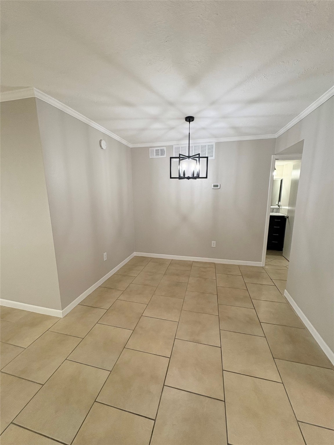2800 Jeanetta Street, Unit 408 Houston, TX 77063 - Photo 7 of 14 a view of empty room with wooden floor and window