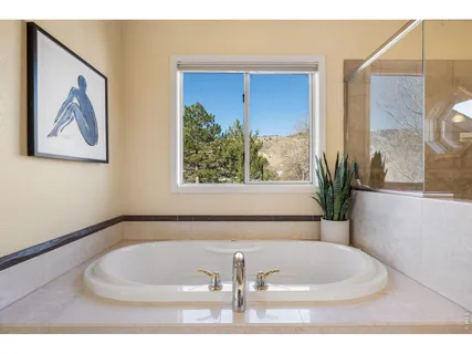a white bath tub sitting in a bathroom