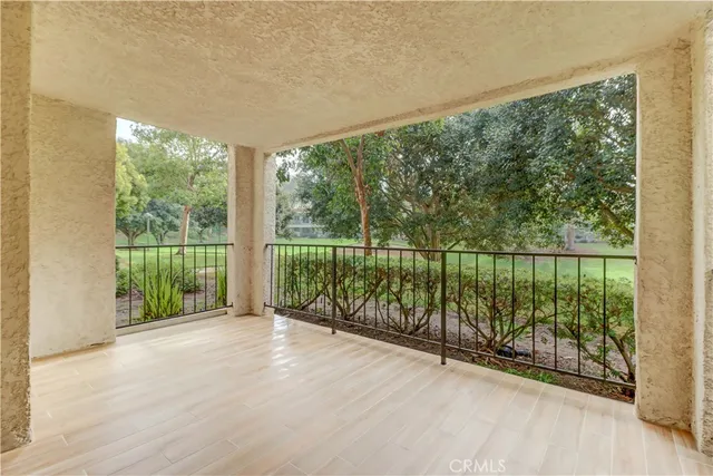 a view of a city street from a balcony