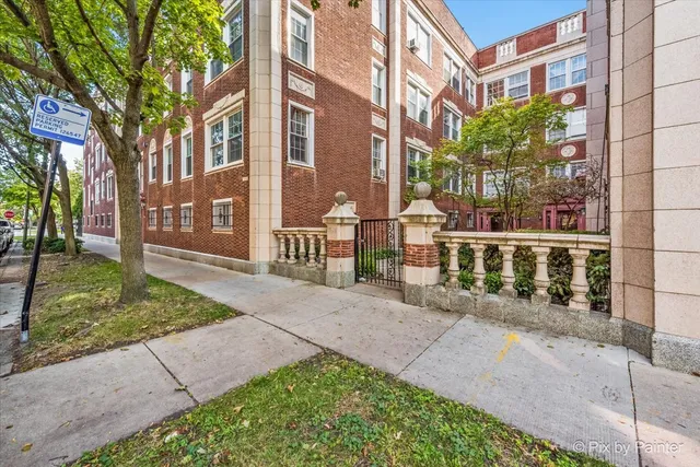 a view of a building with a street