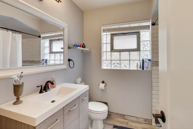 a bathroom with a sink and a toilet
