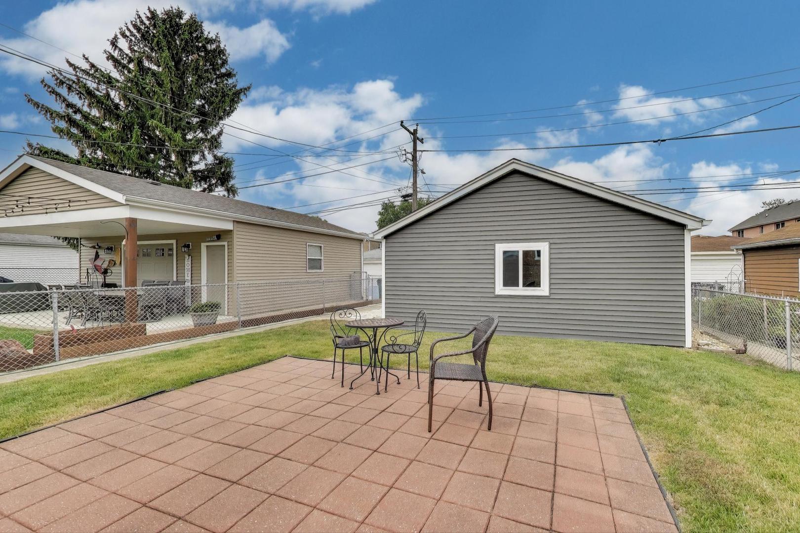 3816 Wisconsin Avenue Berwyn, IL 60402 - Photo 25 of 32 a view of a house with backyard and sitting area