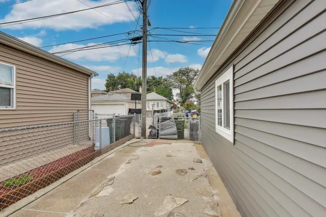 a view of backyard of garage