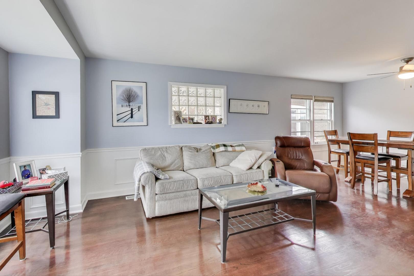 3816 Wisconsin Avenue Berwyn, IL 60402 - Photo 4 of 32 a living room with furniture and wooden floor