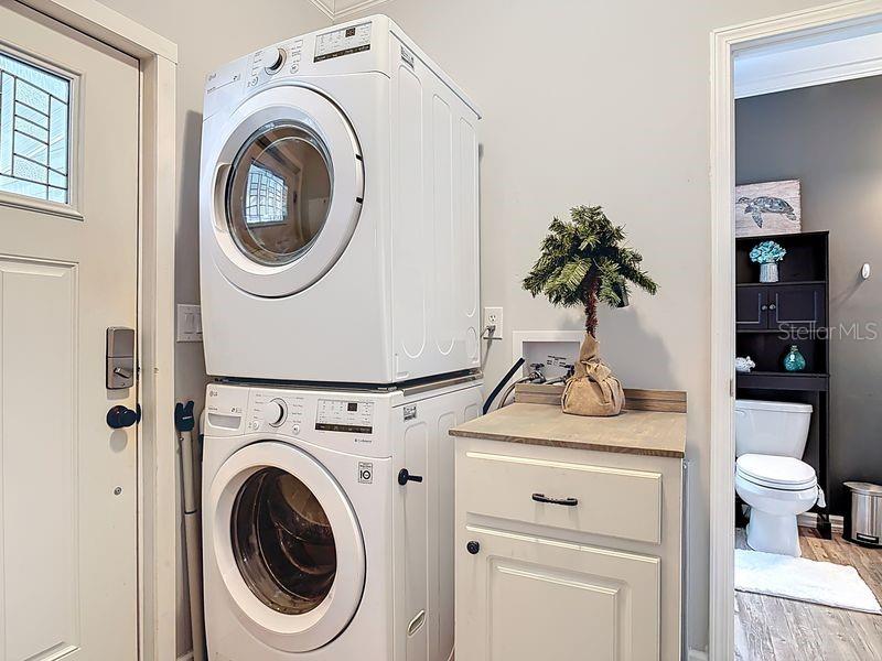 102 Ash Street Edgewater, FL 32141 - Photo 29 of 36 a view of washer and dryer in a utility room