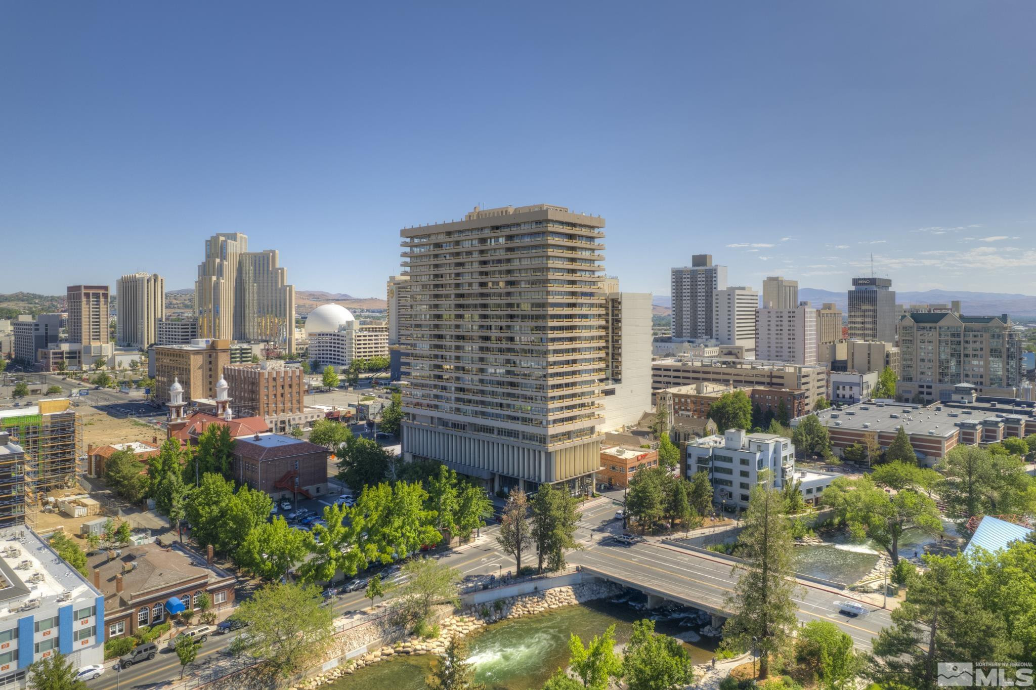 100 North Arlington Avenue, Unit 6B Reno, NV 89501 - Photo 19 of 23 a view of a city with tall buildings