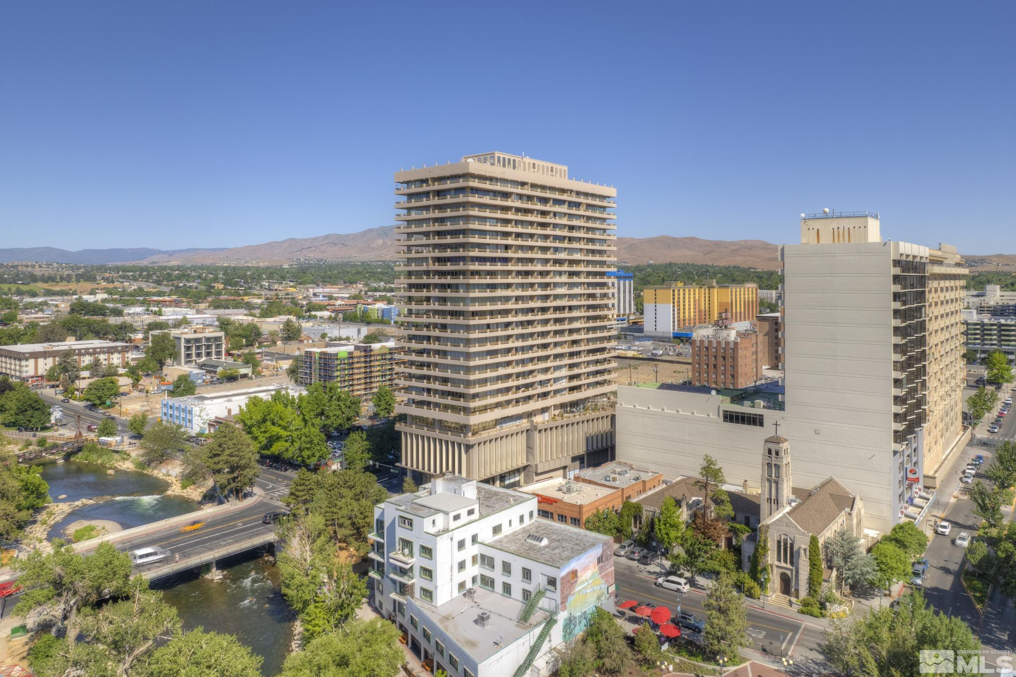 100 North Arlington Avenue, Unit 6B Reno, NV 89501 - Photo 21 of 23 a view of a city with tall buildings