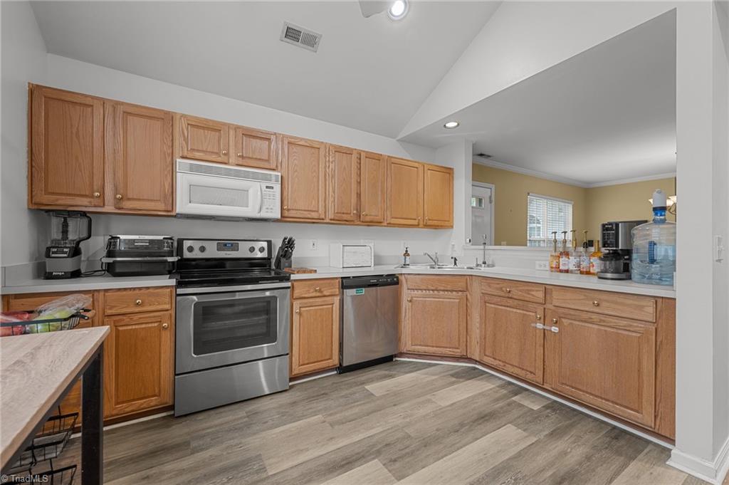 6355 Double Eagle Drive Whitsett, NC 27377 - Photo 7 of 24