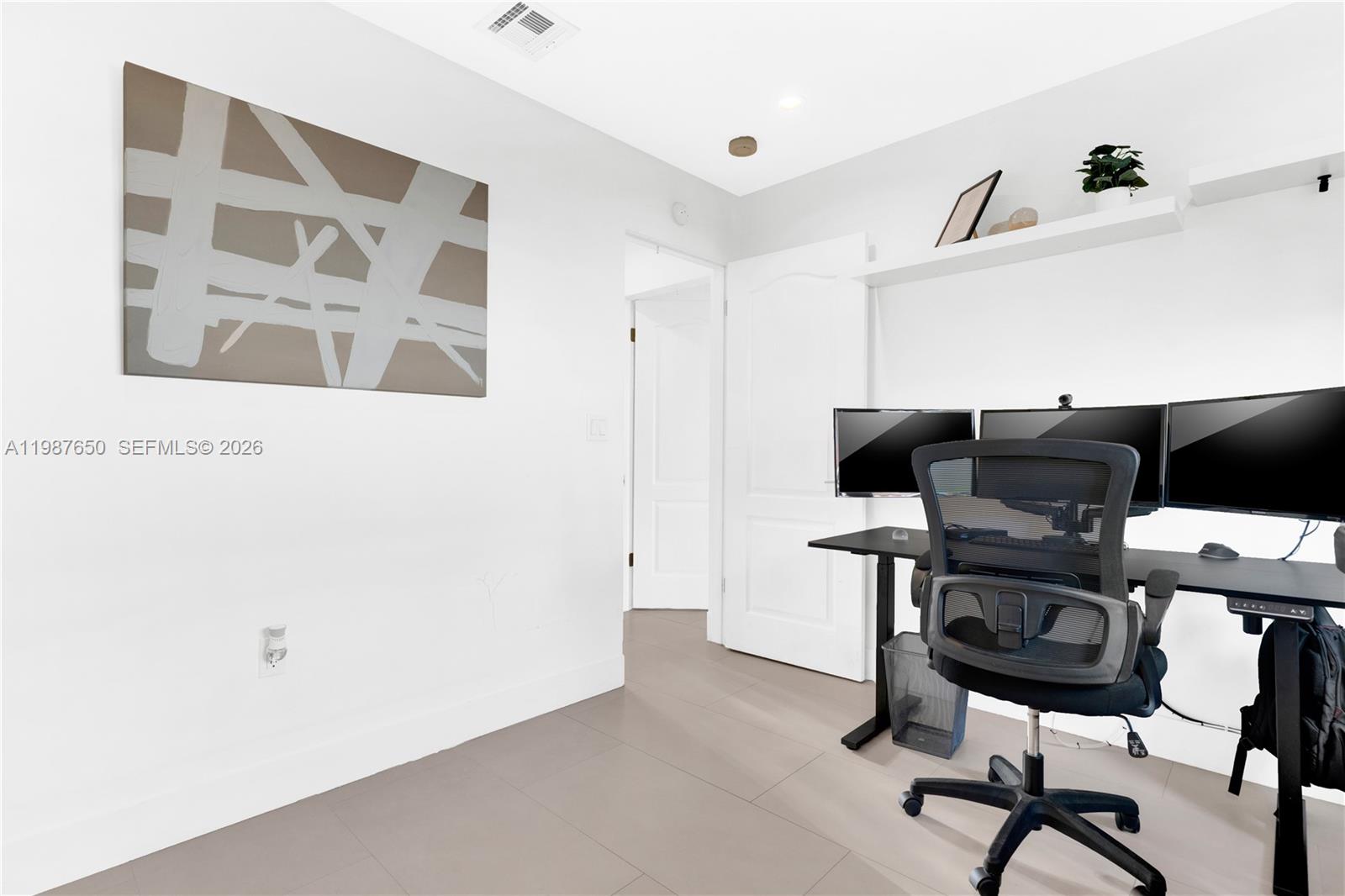 8858 Southwest 214th Street Cutler Bay, FL 33189 - Photo 34 of 41 a view of workspace with windows