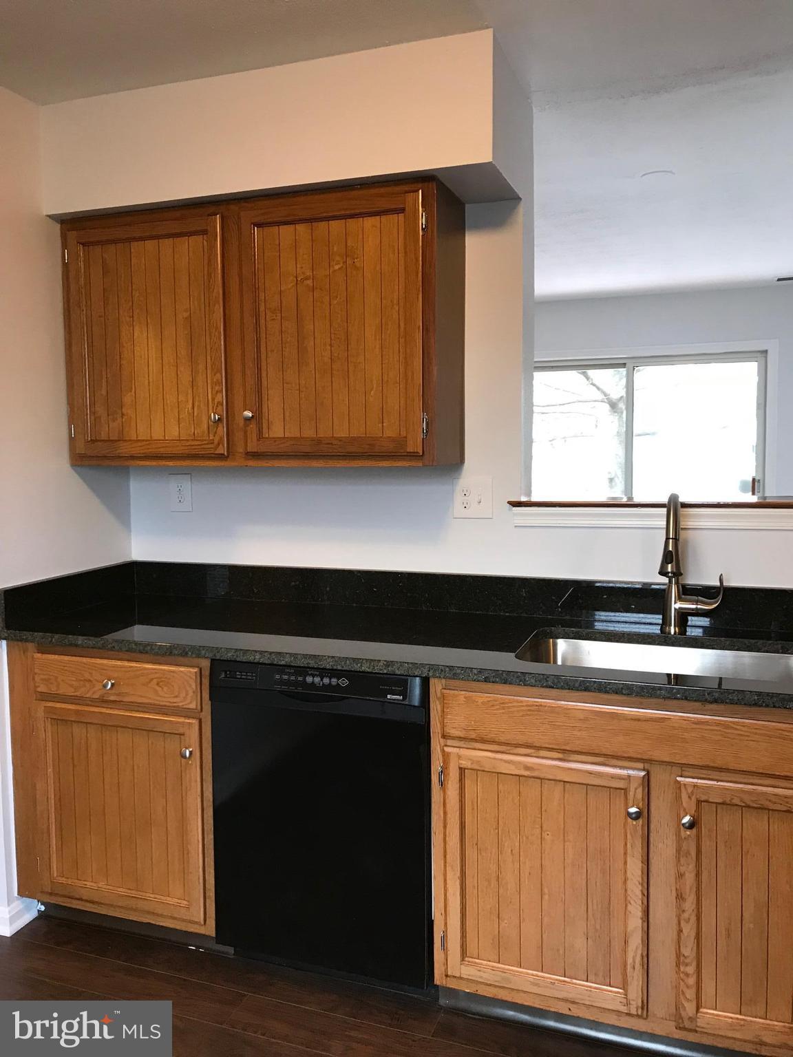 3004 Shepperton Terrace Silver Spring, MD 20904 - Photo 11 of 22 New granite, sink, faucet, oven, flooring.