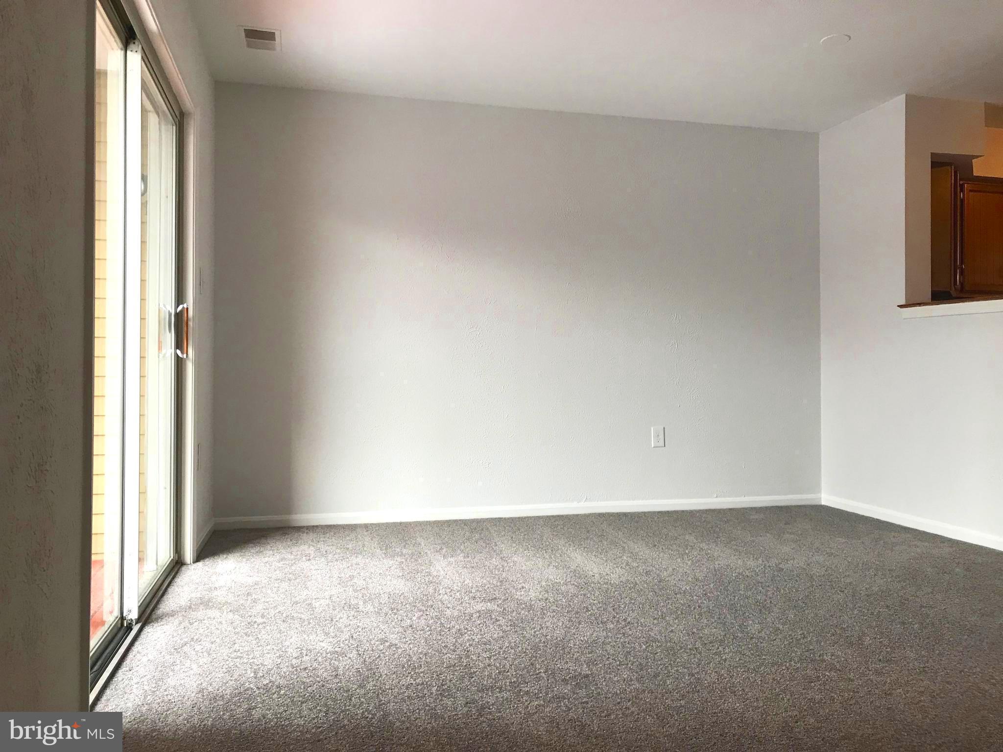 3004 Shepperton Terrace Silver Spring, MD 20904 - Photo 5 of 22 Lots of light into Living Room from roomy deck.