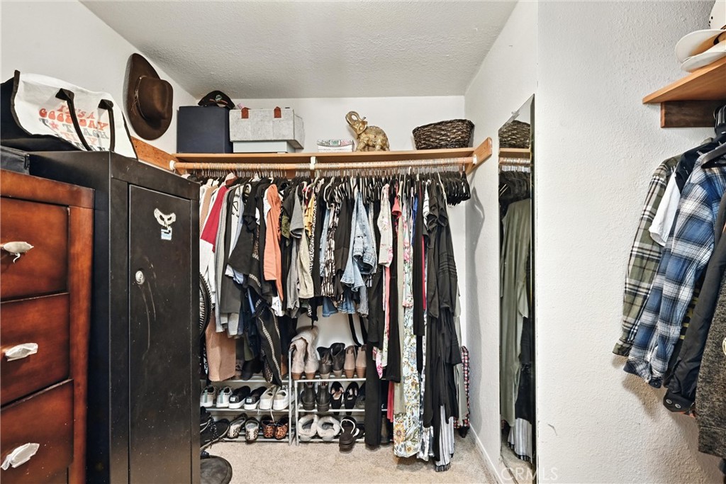 3171 Springe Street Nice, CA 95464 - Photo 15 of 28 a view of walk in closet with clothes and shoes