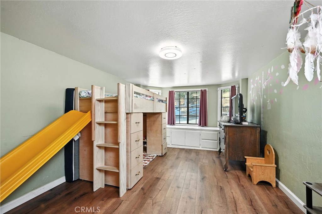 3171 Springe Street Nice, CA 95464 - Photo 16 of 28 a view of a kitchen with furniture and wooden floor