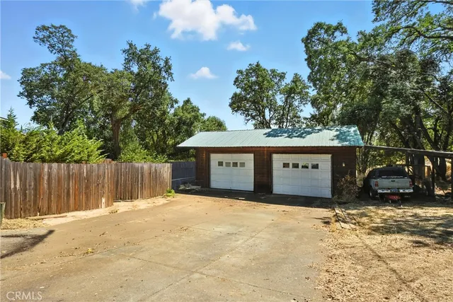 a view of a car park next to a yard